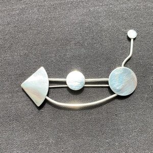 Sterling silver pin. Artisan-handmade piece.